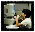 Photo of student using computer.